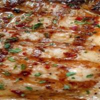 Grilled Pork Chops  {2} · Bone in grilled pork chop seasoned with our soulful blend of herbs and spices and finished w...