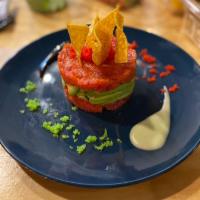 TUNA TARTARE · Tuna and avocado topped with masago and scallion, drizzled with spicy mayo and sweet sauce.
...
