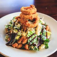 Fried Chicken Salad · Fried chicken bites tossed with mixed greens, corn, cucumbers, red onion and ranch dressing....