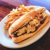Oscar's Cheese Steak Sandwich · Sliced steak cooked with red and green peppers, onions, mushrooms and topped with queso chee...