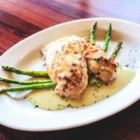 Chicken Chesapeake · Two sauteed chicken breasts topped with crab imperial surrounded by a traditional chesapeake...