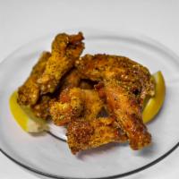 Lemon Pepper Wings · 10 Piece Wing dusted with Lemon Pepper and coated in Lemon Pepper Sauce