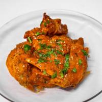 Hot Wings · 10 Piece Wings tossed and coated in our scratch made Hot Wing Sauce