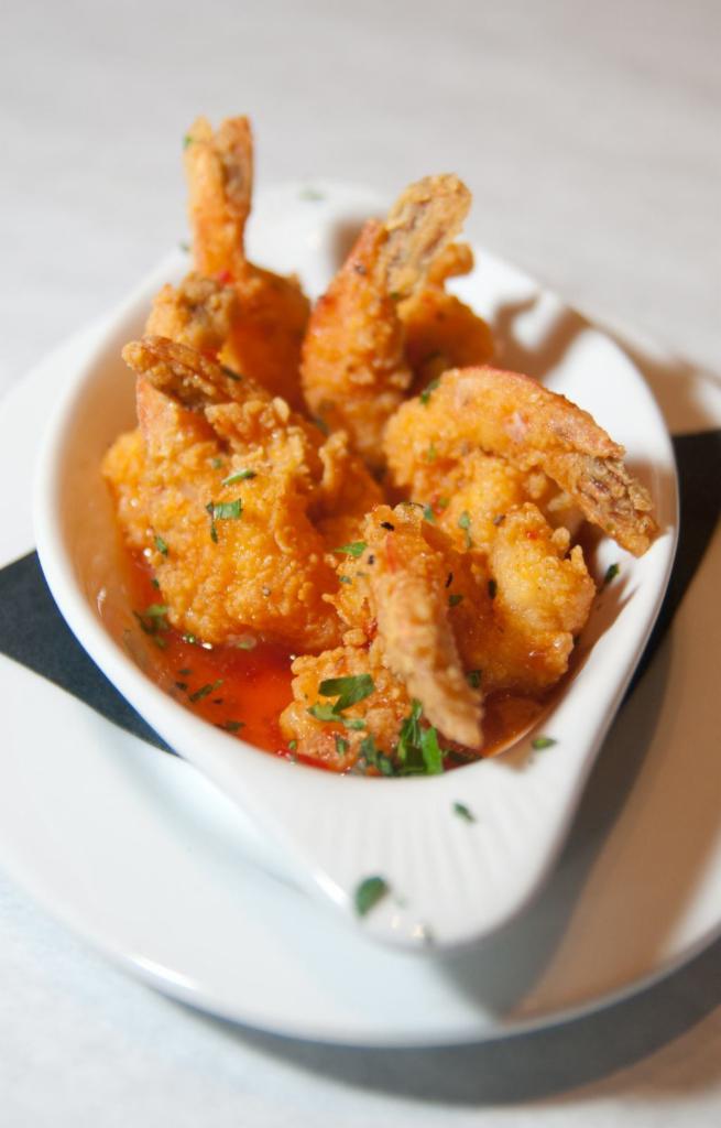 Sweet Heat Shrimp  · Fried jumbo shrimp tossed in our sweet heat sauce.
