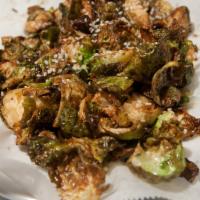 Aunt Rita's Fried Brussels Sprouts · Tossed in an Asian sauce.