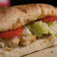 10. Cowboy Chicken Grinder · Chicken, bacon, onions, diced tomatoes, jalapenos and our homemade chipotle ranch sauce. Bak...