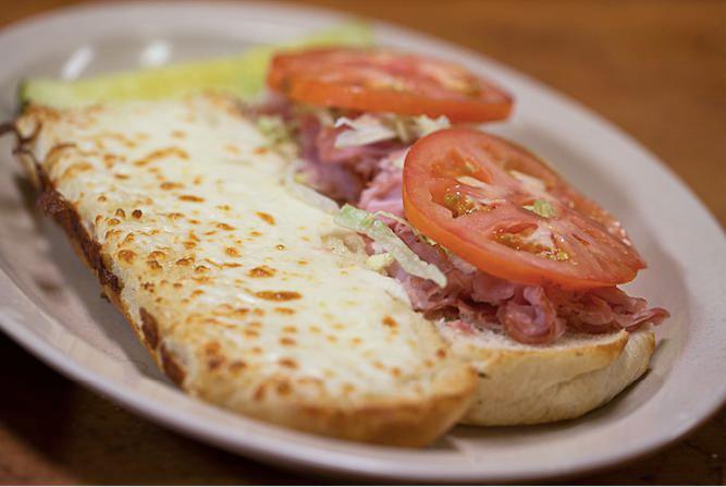 18. Ham Classic Grinder · Ham, mayo, lettuce and tomatoes. Baked and served hot, with our 4 cheese blend of mozzarella, Muenster, white cheddar and provolone.