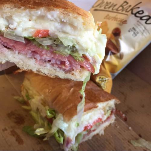 19. Ham and Salami Grinder · Ham, salami, mayo, lettuce and tomatoes. Baked and served hot, with our 4 cheese blend of mozzarella, Muenster, white cheddar and provolone.