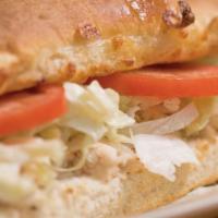 23. Turkey Classic Grinder · Turkey, mayo, lettuce and tomatoes. Baked and served hot, with our 4 cheese blend of mozzare...
