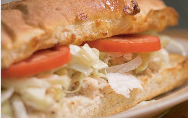 23. Turkey Classic Grinder · Turkey, mayo, lettuce and tomatoes. Baked and served hot, with our 4 cheese blend of mozzarella, Muenster, white cheddar and provolone.