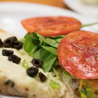 32. Veggie Grinder · Mushrooms, onions, green peppers, black olives, mayo, lettuce and tomatoes. Baked and served...