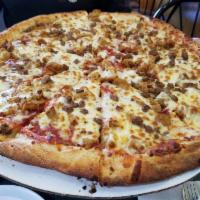 Meat Lovers Pizza · Pepperoni, ham, bacon, sausage and ground beef, topped with our special 4 cheese blend.