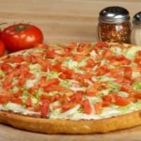 Mancino's BLT Pizza · Mayo, bacon, diced tomatoes, our 4 cheese blend and then topped with lettuce and even more t...
