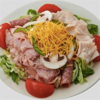 Mancino's Chef Salad · Lettuce, tomatoes, ham, turkey, salami, onions, green peppers, mushrooms and cheddar cheese ...