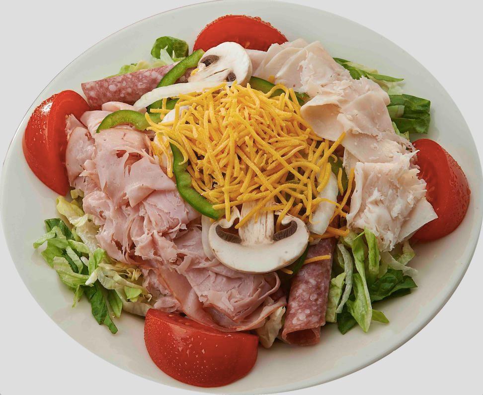 Mancino's Chef Salad · Lettuce, tomatoes, ham, turkey, salami, onions, green peppers, mushrooms and cheddar cheese with 2 dressings.