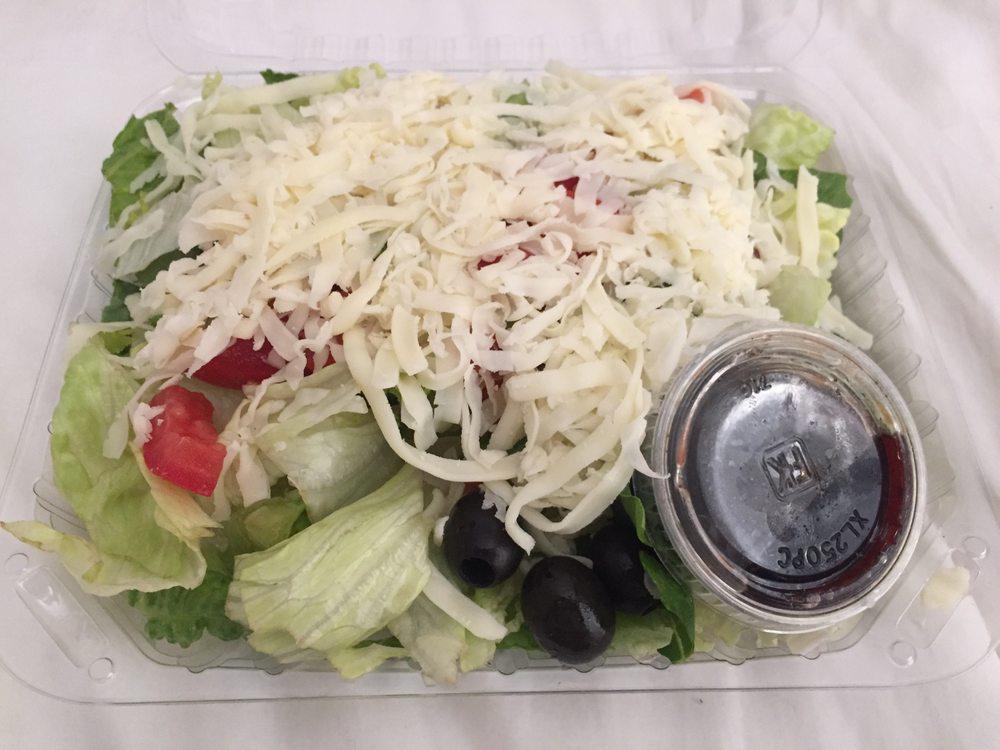Antipasto Salad · Lettuce, tomatoes, pepperoni, ham, onions, hot pepper rings, green and black olives, white cheese with 2 dressings.
