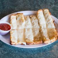 Mancino's Bread Sticks · Six tasty bread sticks, with pizza sauce or ranch to dip.