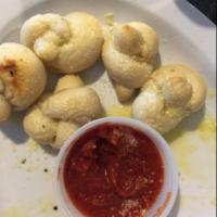 5 Piece Garlic Knots · Our famous Garlic Knots, homemade and handmade, fresh and tasty.