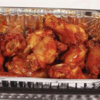 Baked Chicken Wings · Traditional baked hot wings served (your choice) Plain, BBQ or Hot Wings Sauce