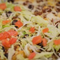 Nachos Supreme · Taco meat, cheddar and mozzarella cheese, onions and black olives served over nacho chips, t...