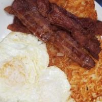 Bacon and Eggs · Hardwood smoked, honey cured bacon served with 2 eggs any style, hash browns and toast.
