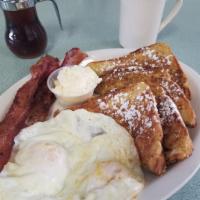 French Toast Breakfast · 2 pieces of Texas size French toast, 2 eggs any style, bacon or sausage.