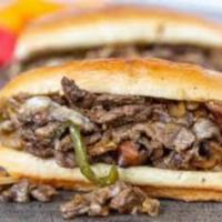 2. Philly Cheese Steak Bomb · Chopped top sirloin steak topped with onions, mushrooms, green peppers, provolone cheese, no...