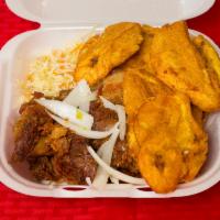 Grio Simple · Served with fried pork chunks and fried plantains with salad (lettuce and tomatoes) and pick...