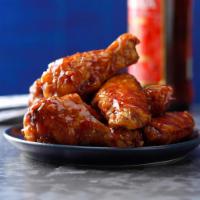 BBQ Wings · Crispy and flavorful classic chicken wings with Buffalo flavor packed sauce.