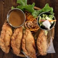 1. Ka Ree Puff · Deep fried Thai puff pastry filled with chicken and curry powder. Served with cucumber dip a...