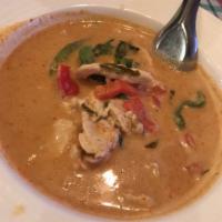 4. Panang Curry · Panang curry with choice of meat, bell pepper, basil and kaffir leaves.
