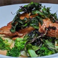 6. Choo Chee Salmon Curry · Deep-fried salmon with steamed mixed vegetables and panang sauce. Topped with coconut cream,...