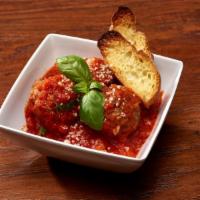 Polpette · Beef and pork meatballs with tomato conserve sauce.