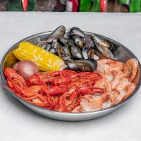 1 Combo  · ½ LB EACH OF SHRIMP HEAD OFF, BLK MUSSELS AND CRAWFISH COMES WITH CORN ON THE COB (1) & POTA...