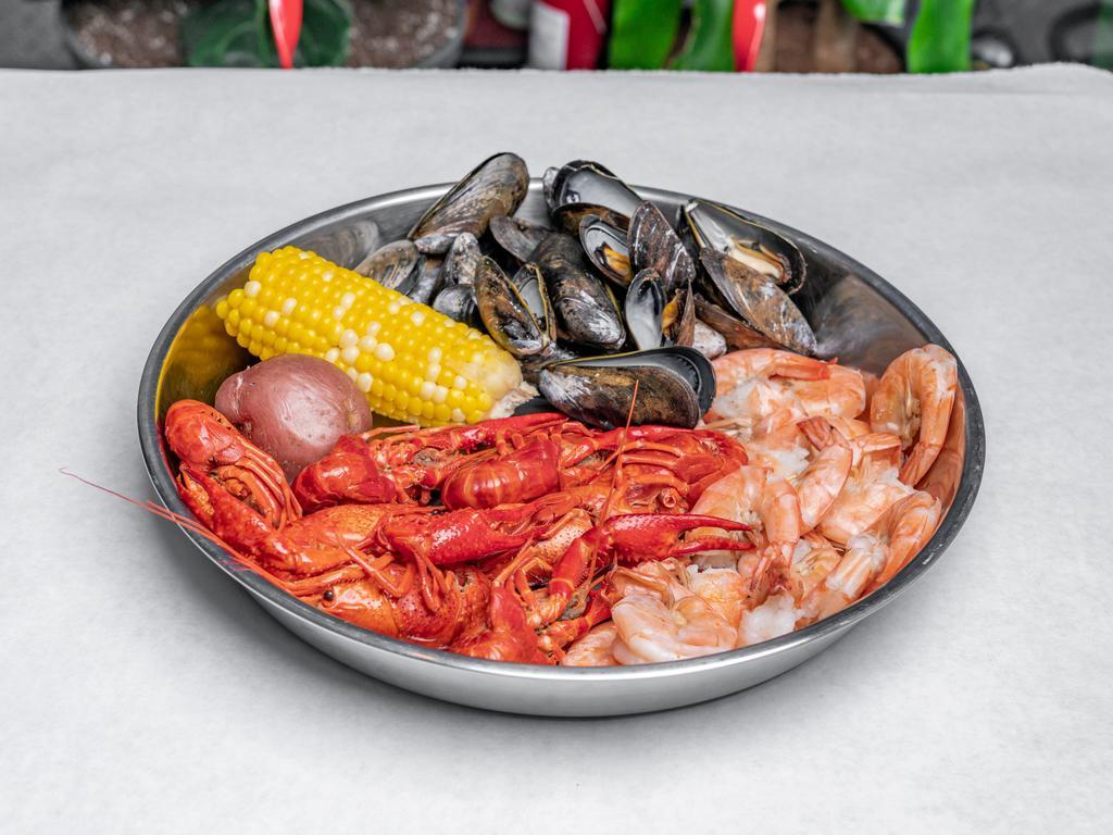 1 Combo  · ½ LB EACH OF SHRIMP HEAD OFF, BLK MUSSELS AND CRAWFISH COMES WITH CORN ON THE COB (1) & POTATO (1) 