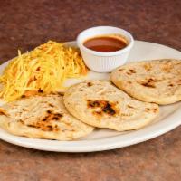 Pupusas · Corn tortillas stuffed with your choice of cheese, refried beans, pork or loroco.