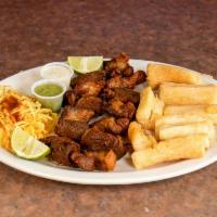 Yuca con Chicharron · Fried cassava root (yucca), served with chunks of refried pork. Topped with marinated cabbage.