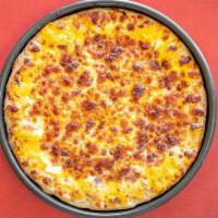 6. Nacho Queso Pizza · Our creamy nacho queso sauce is topped with blend of Mexican cheeses and served with a side ...