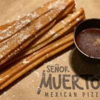 Churros in A Box · Enjoy fresh fried churros, cinnamon, and sugar with our Mexican chocolate sauce.