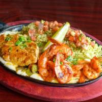 Sizzling Street Fajitas · A flavorful, sizzling dish of grilled steak, chicken or shrimp, served on top of a bed of sa...