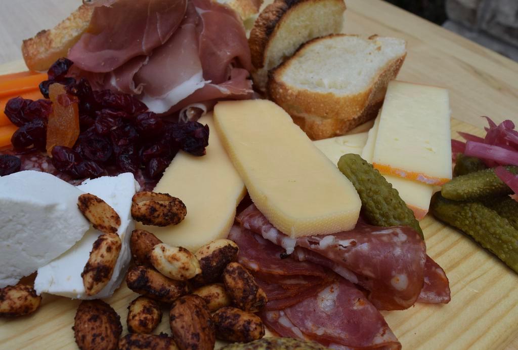 Large Mr. Miner's Board · 4 charcuterie & 4 cheese selections served with accoutrement 