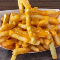 Cheese Fries · Crispy fries loaded with cheese wiz.
