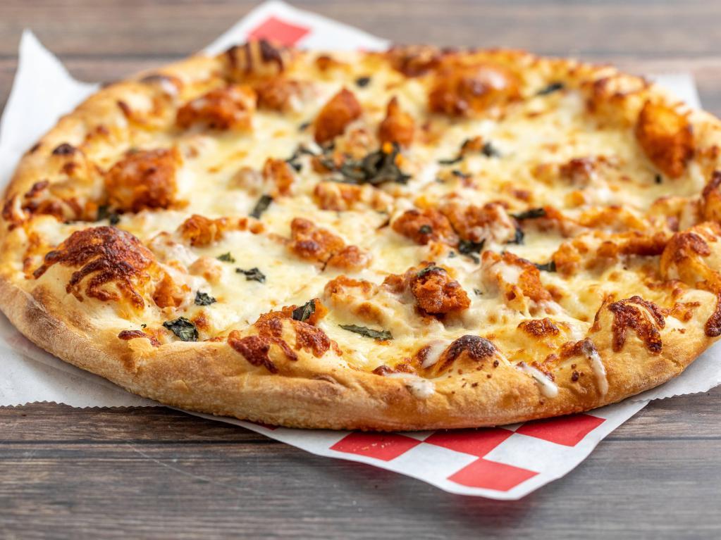 Buffalo Chicken Ranch Pizza · Chicken marinated in hot sauce and covered with ranch dressing.
