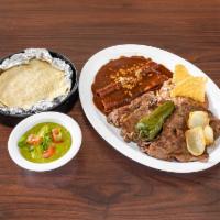 Tampiquena · Beef, grilled onion, guacamole, 2 enchiladas of mole, beans, grilled onion. Served flour or ...