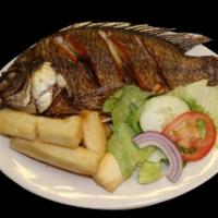 Pescado Frito · Fried whole tilapia. Served with choice of 2 side orders.