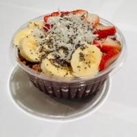 Superfood Power Bowl · Base - kale, acai, pitaya, pineapple, almond milk. Toppings - granola, banana, strawberry, c...