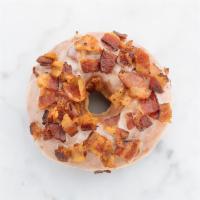 Maple Bacon Doughnut · Raised doughnut topped with pure Vermont syrup glaze and crisp, Zoe's applewood smoked bacon.