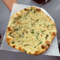 Garlic Naan · Fresh made bread, topped with fresh garlic, cilantro and butter 