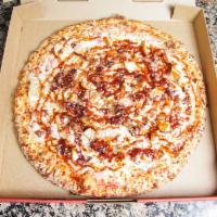 BBQ Chicken Pizza · BBQ chicken, red onions and bacon. Famous BBQ sauce.