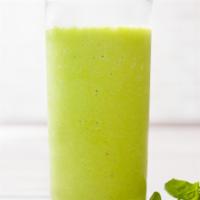 Green Tropical Smoothie · Coconut milk, pineapple juice, ginger juice, lime juice, bananas, pineapple , spinach and he...